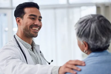 A primary care doctor and patient in a doctor’s office in North Texas